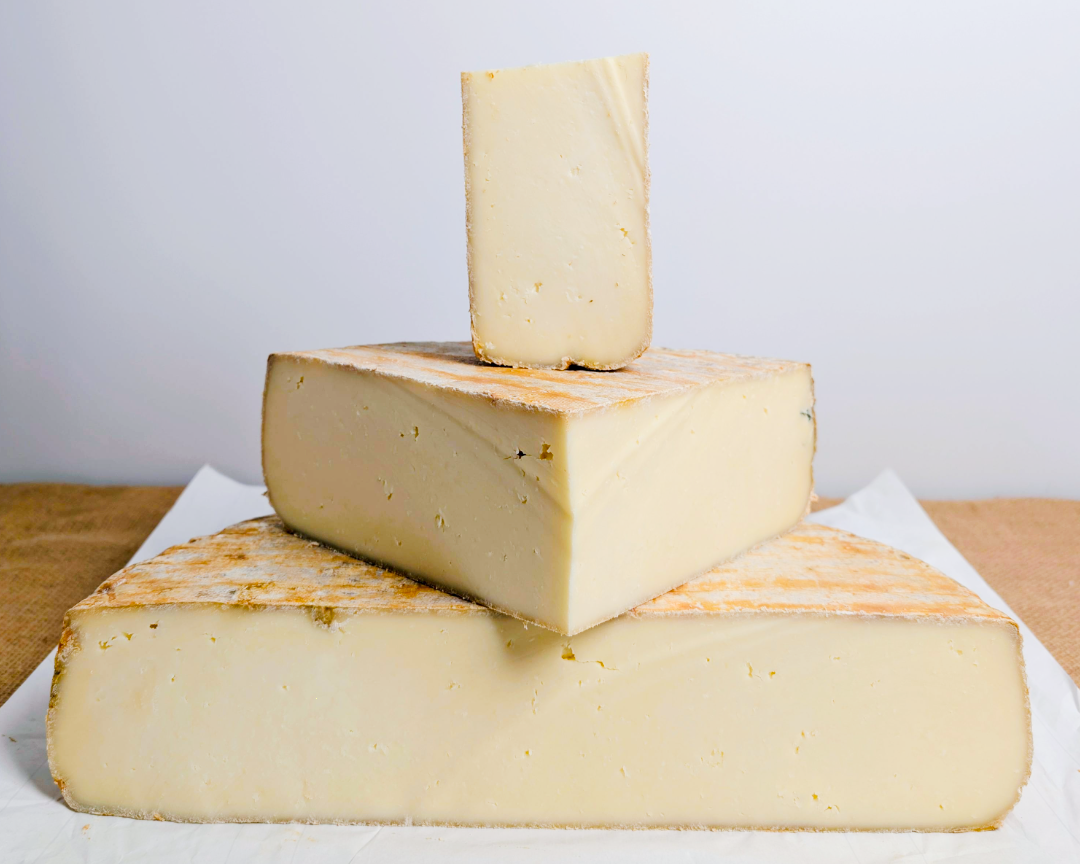 Three blocks of cheese stacked on top of each other 'Carwyn's Angels' Angel No. 10