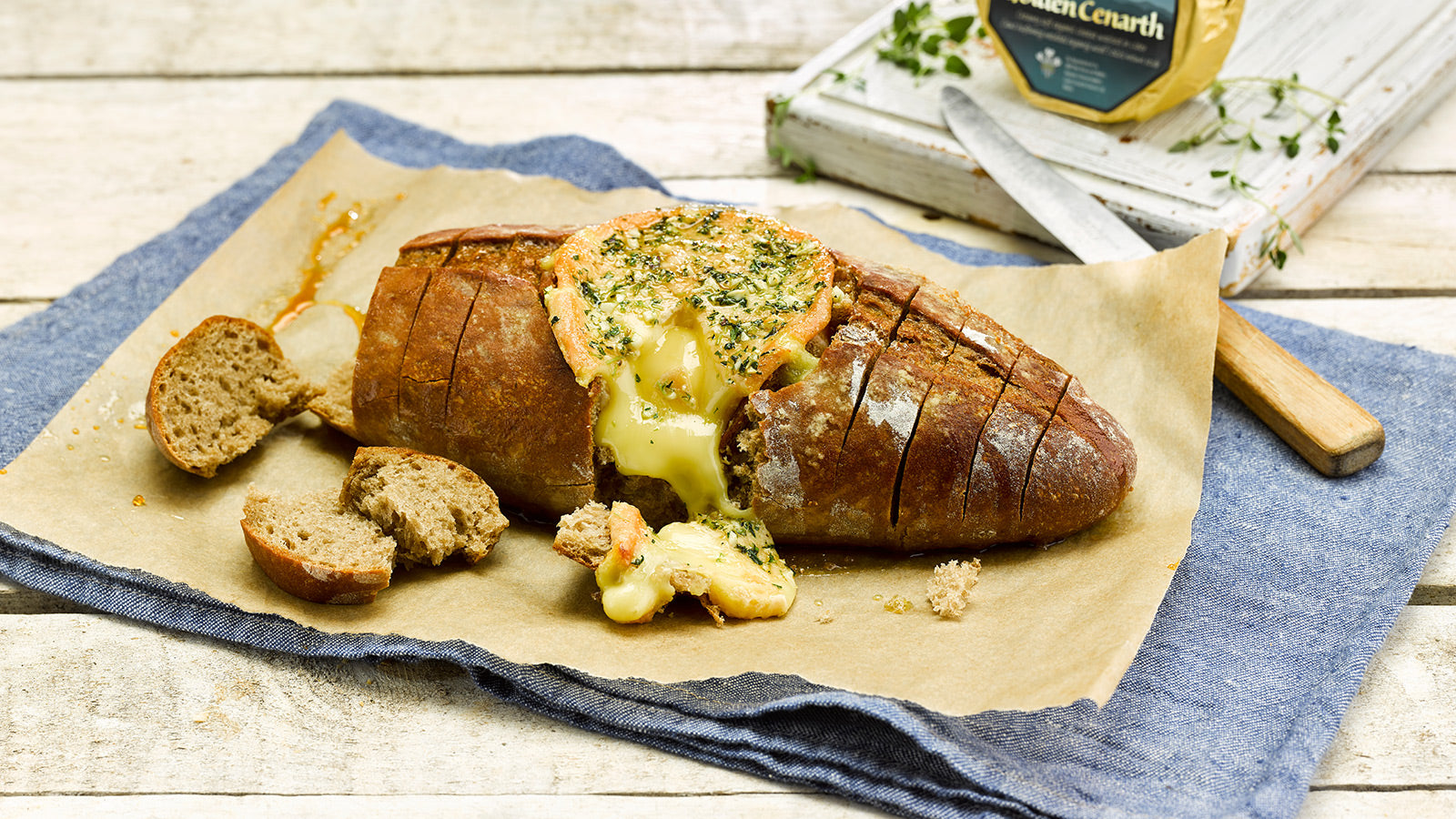 Baked Golden Cenarth in Sourdough Bread